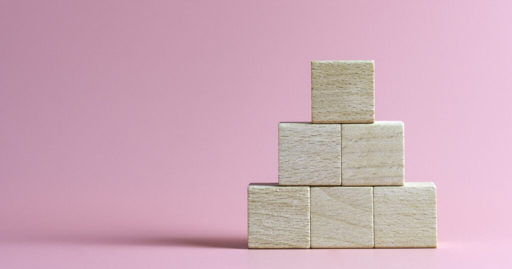 blank wood cube mock up in pyramid shape on isolated background for create letter or symbol, business, banner, advertising concept, banner size with copy space